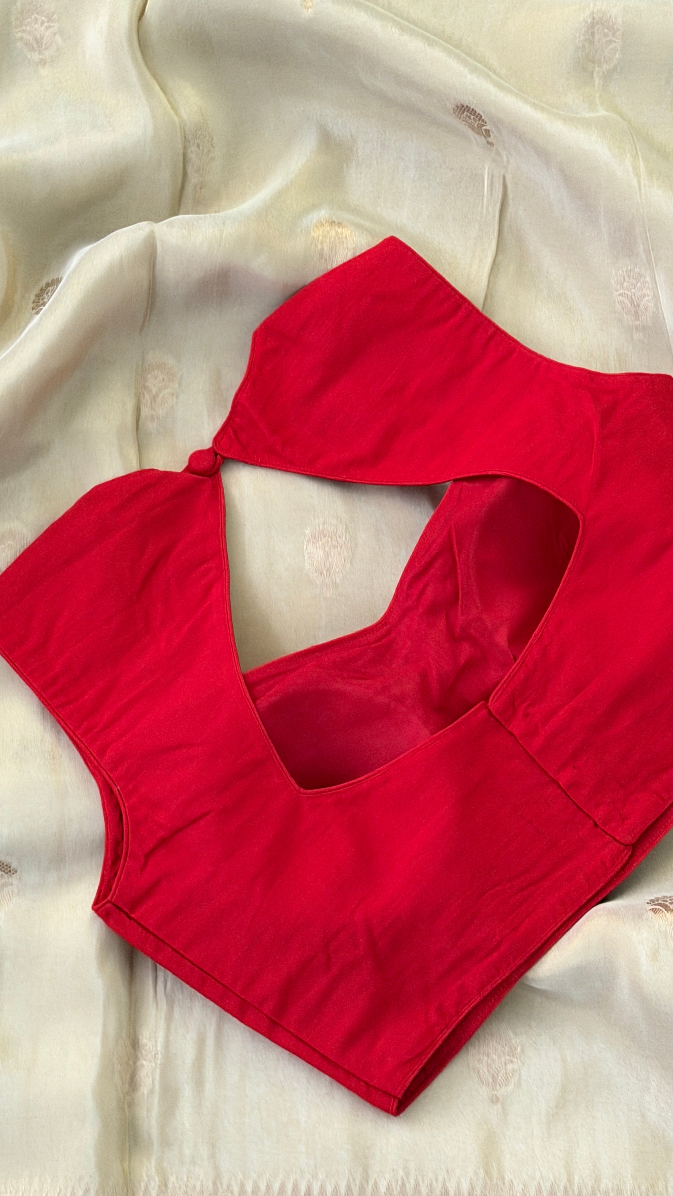 Red Sleeveless Blouse