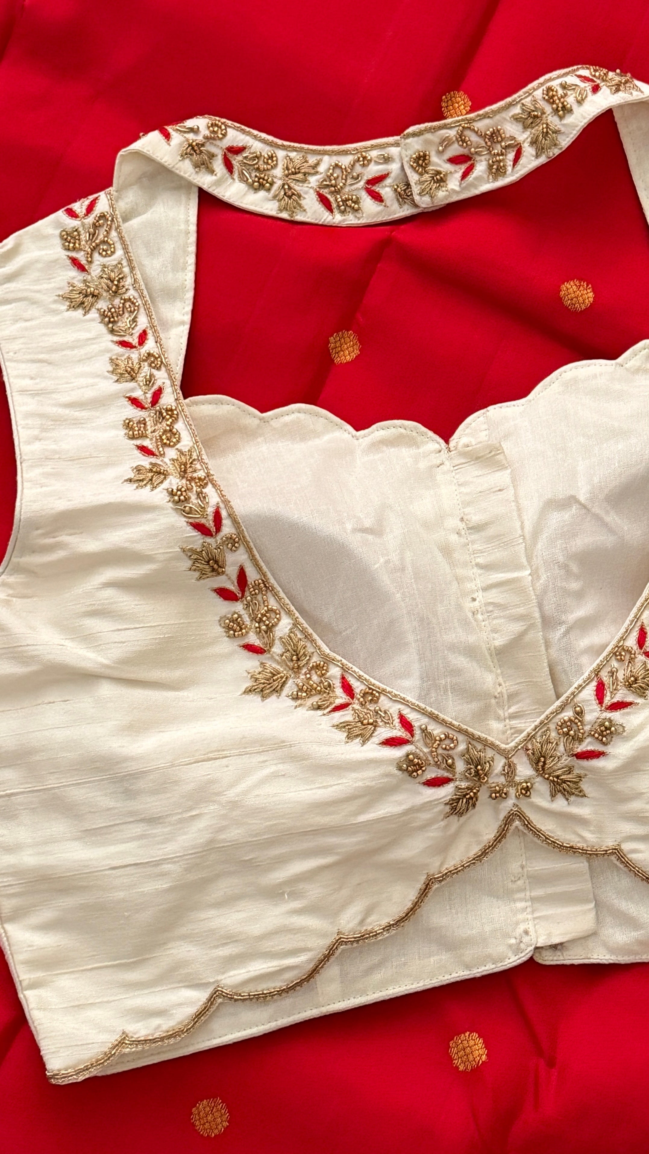 Ivory-Red Sleeveless Petal Blouse