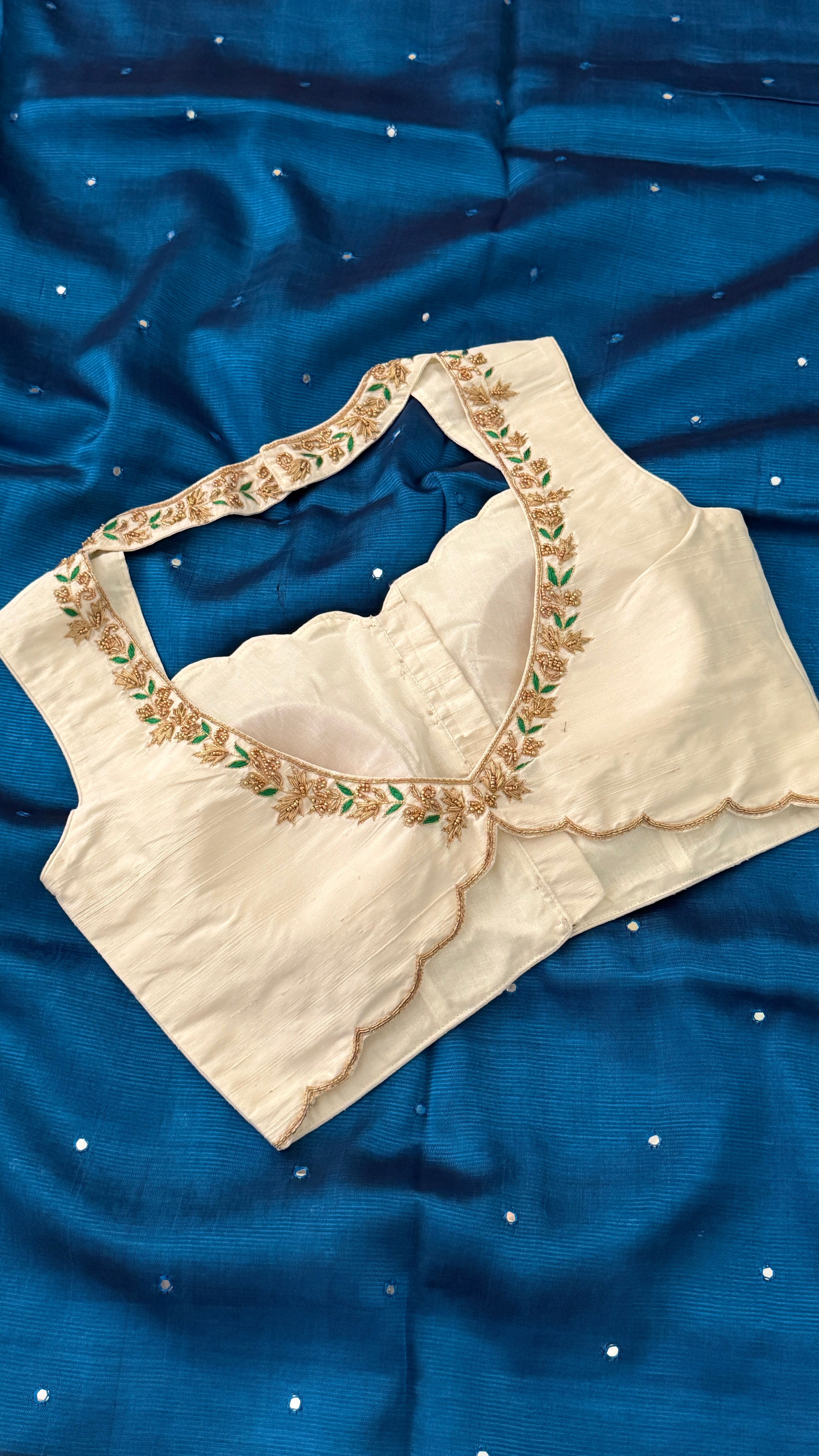 Ivory-Green Sleeveless Petal Blouse