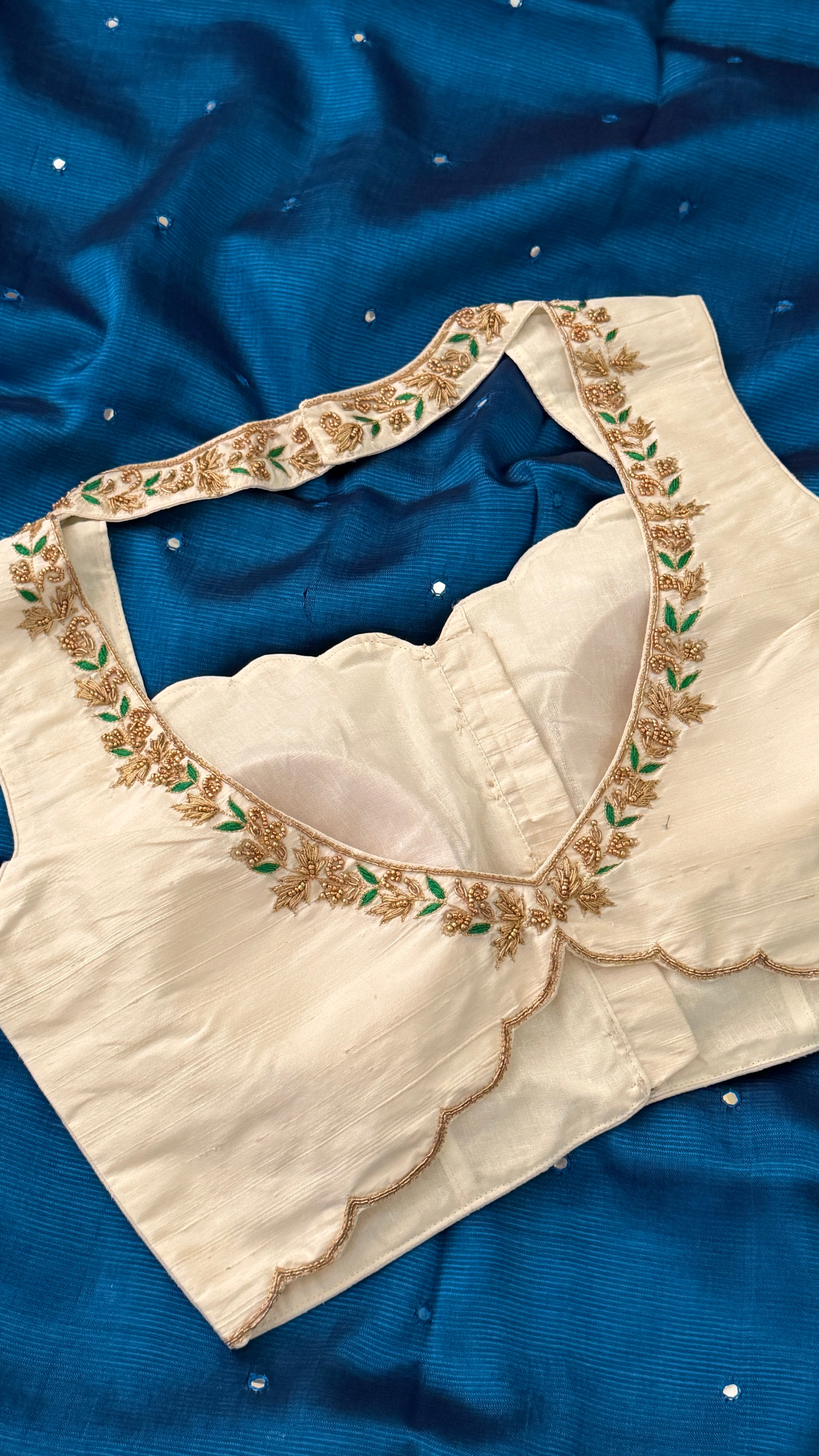 Ivory-Green Sleeveless Petal Blouse
