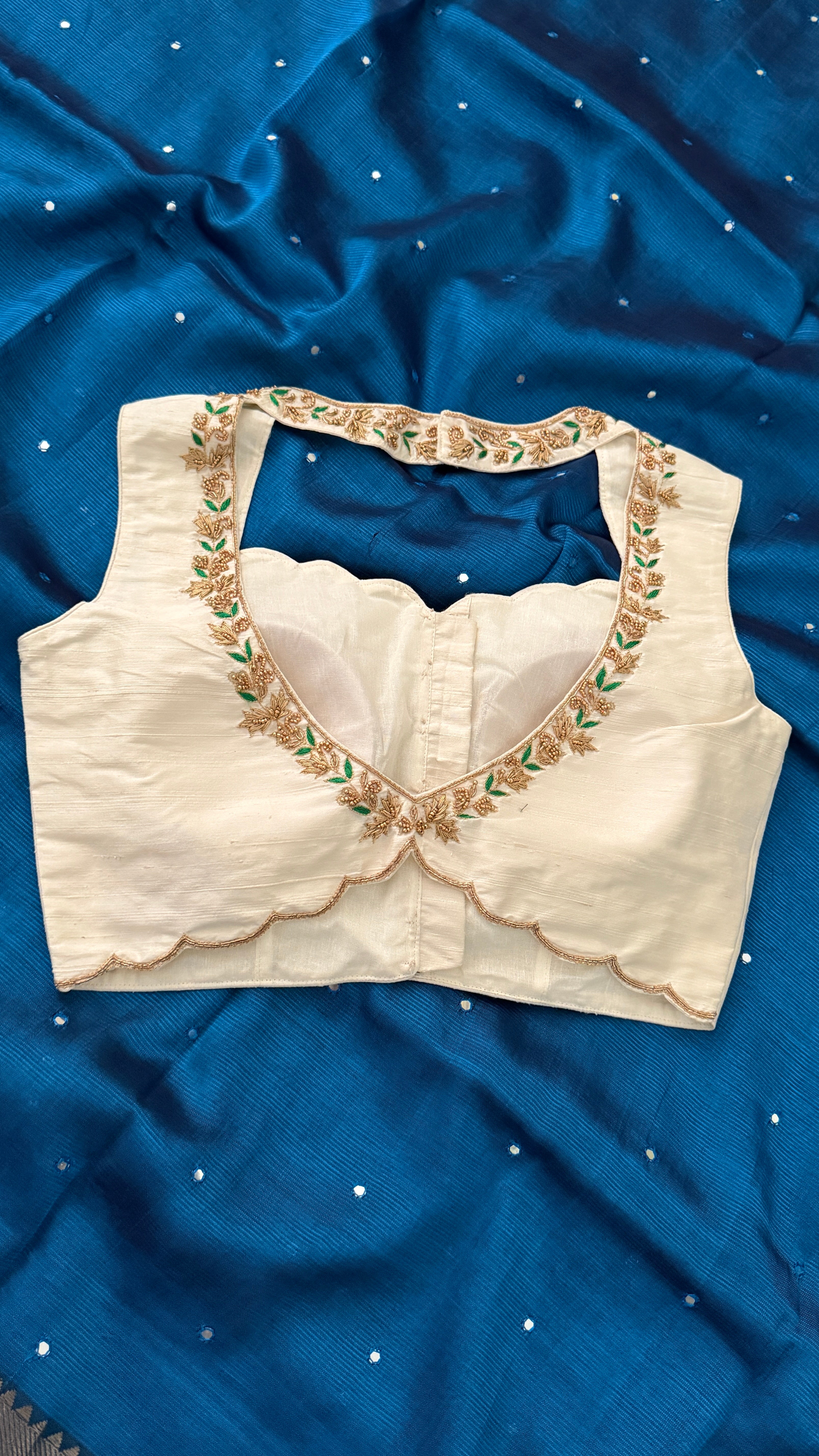 Ivory-Green Sleeveless Petal Blouse