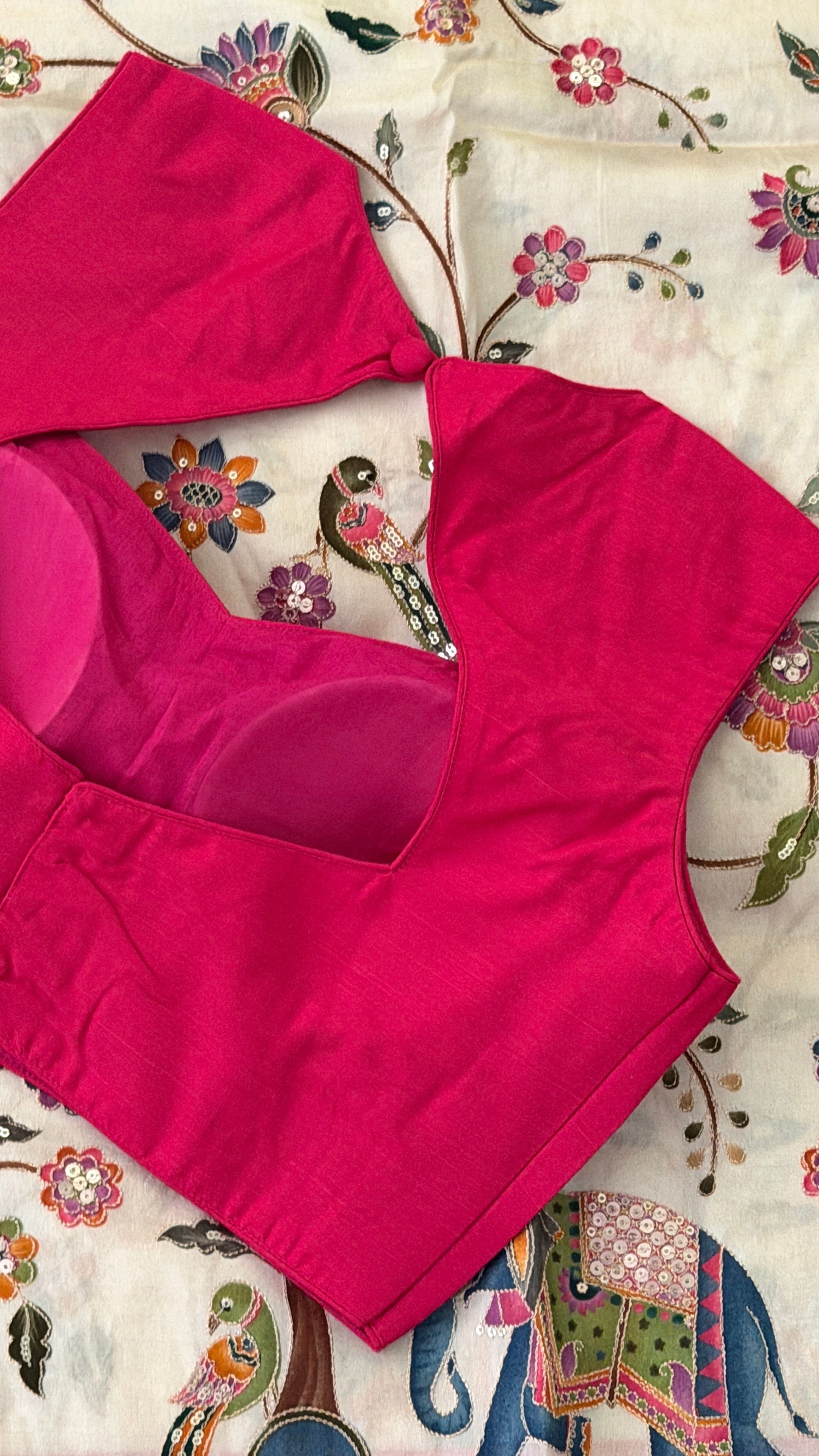 Pink Sleeveless Blouse
