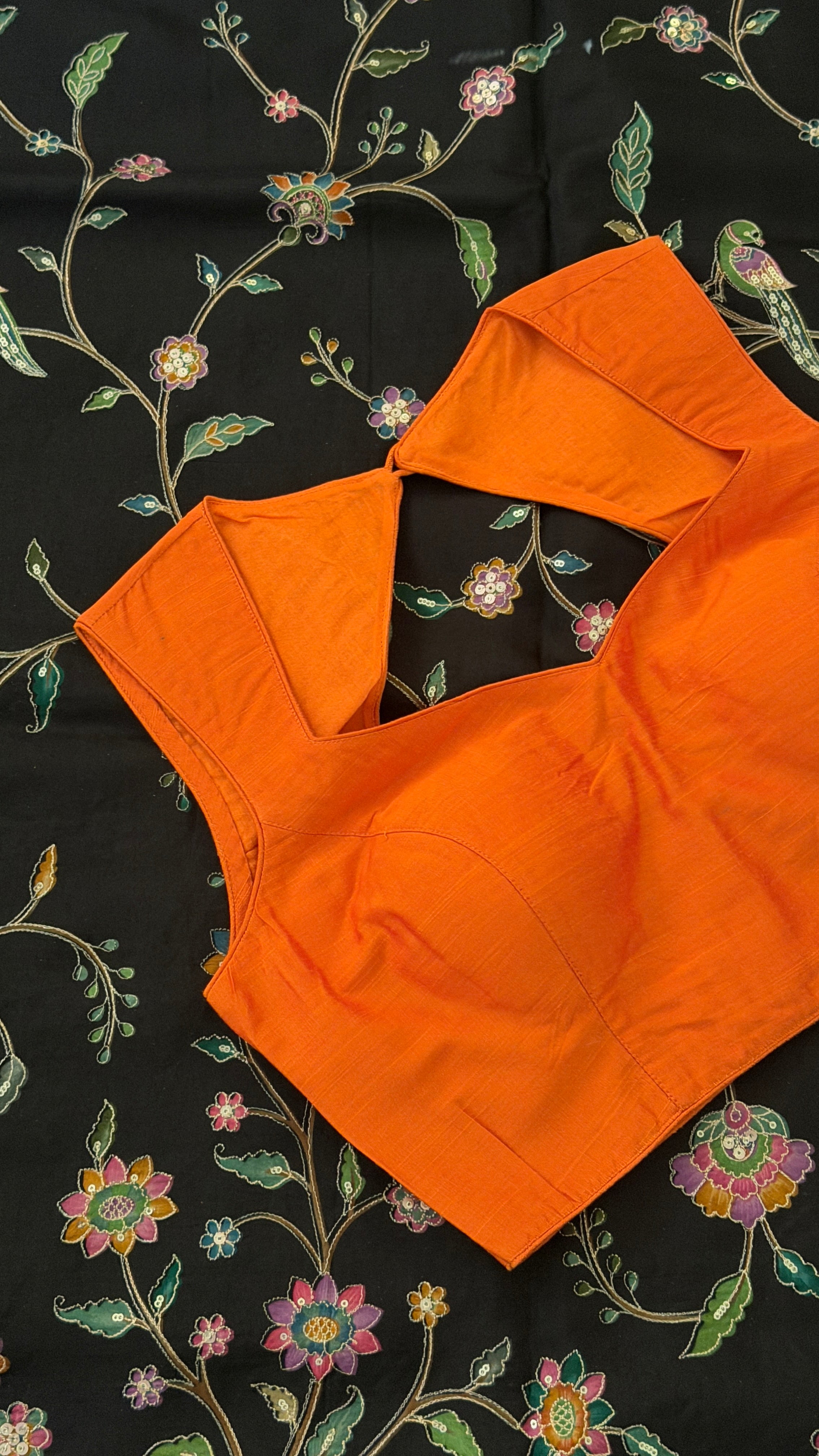 Orange Sleeveless Blouse