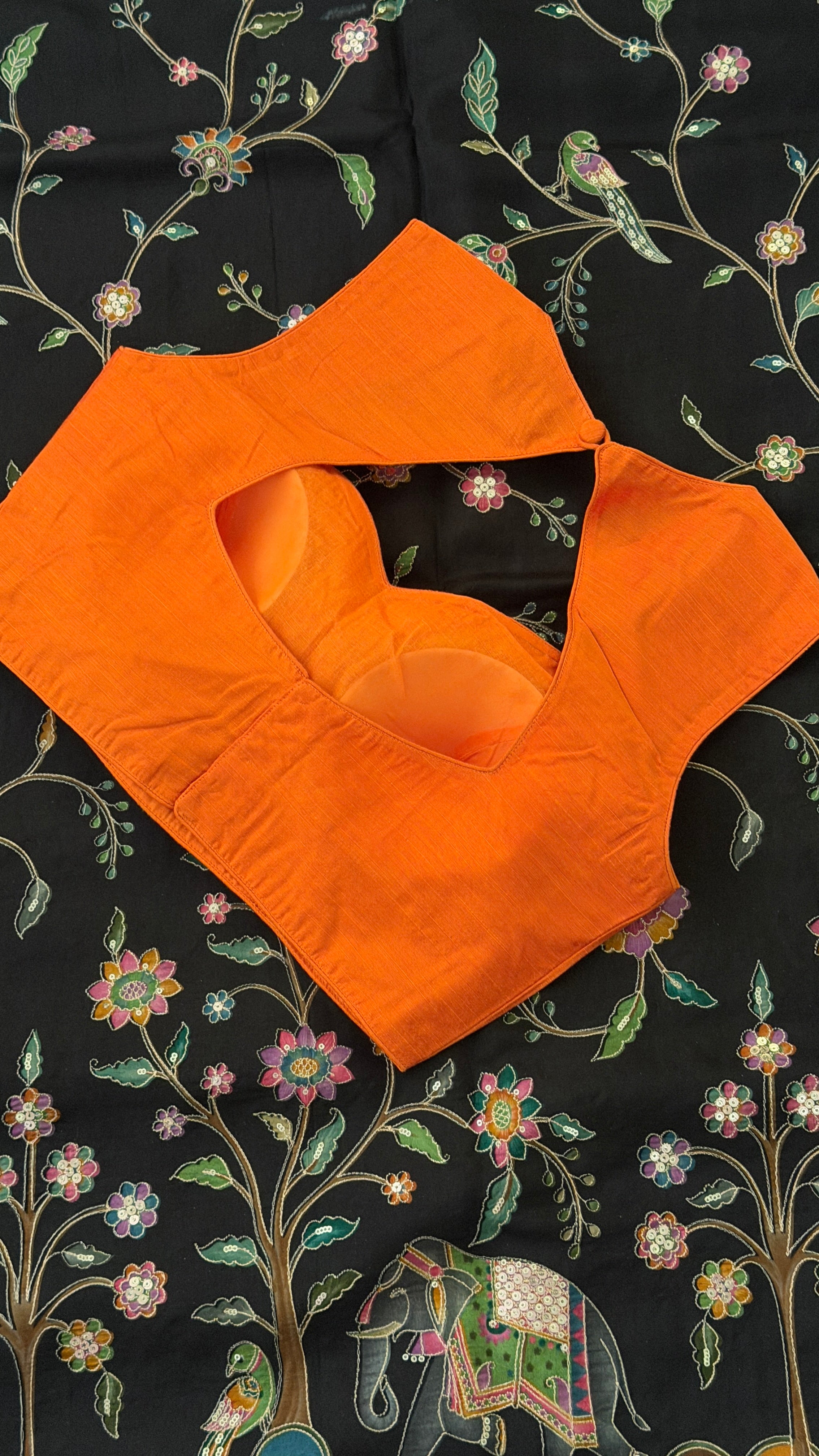 Orange Sleeveless Blouse